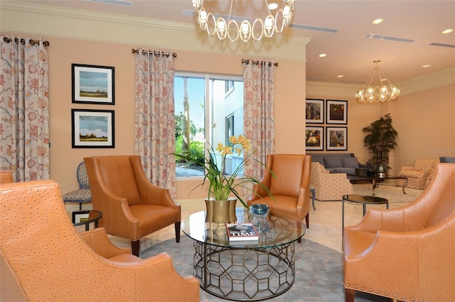 sitting room featuring crown molding and a chandelier