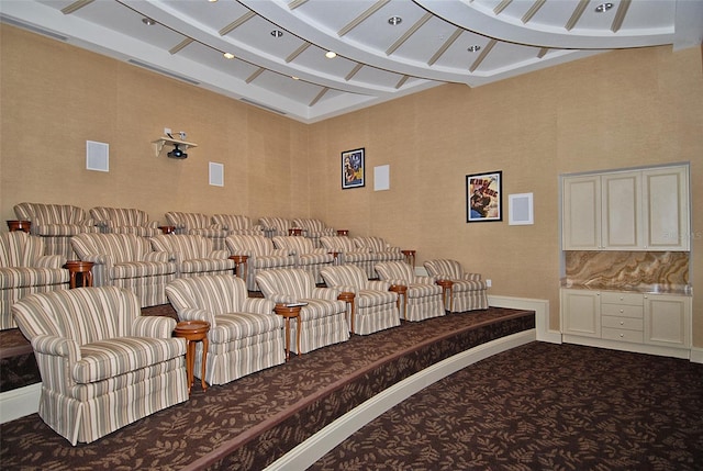 cinema room featuring carpet floors