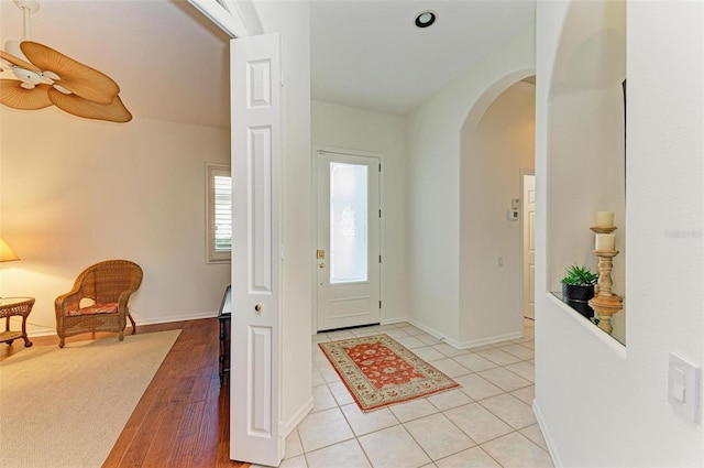 entryway with light hardwood / wood-style floors