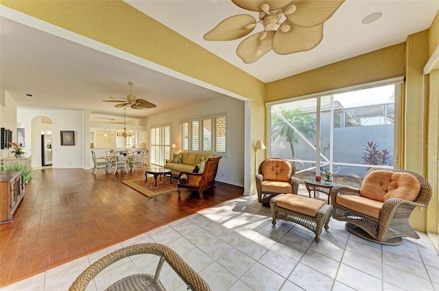 interior space featuring ceiling fan