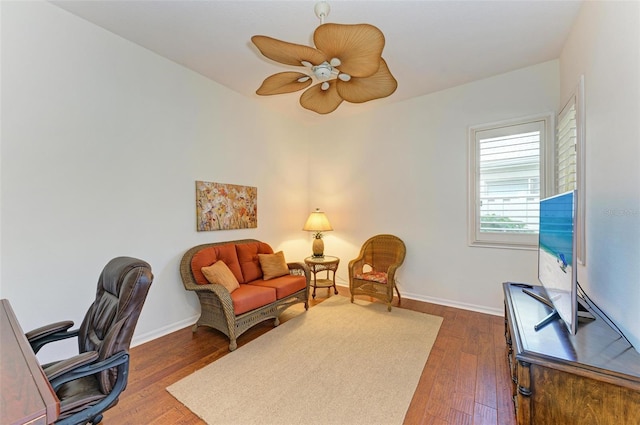 home office featuring ceiling fan and hardwood / wood-style floors