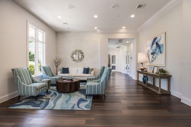 living room with dark hardwood / wood-style flooring and ornamental molding