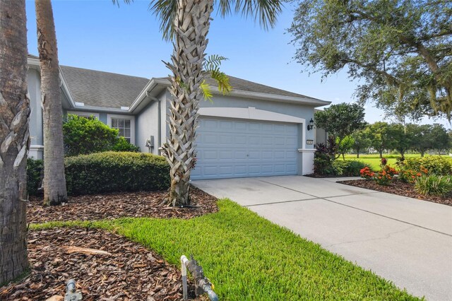 single story home with a garage