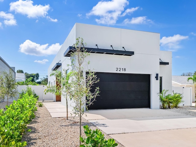 modern home featuring a garage