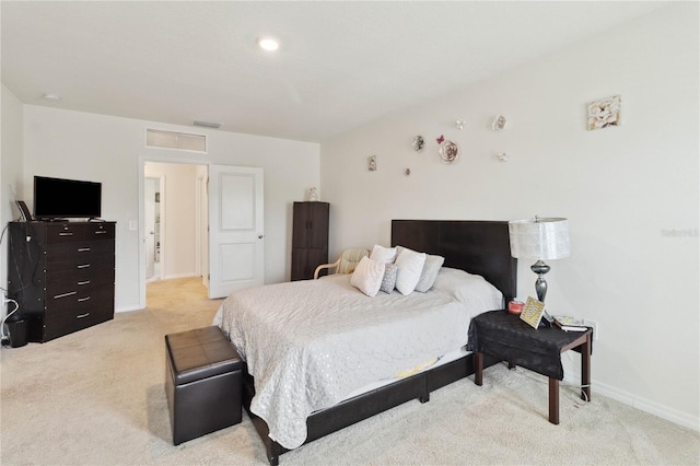 bedroom with light carpet