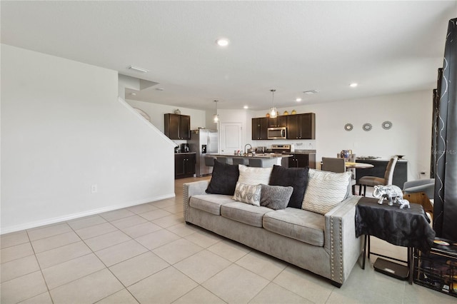 living room with light tile patterned floors