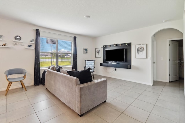 living room with light tile patterned flooring