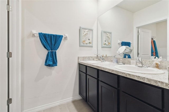 bathroom with vanity and tile patterned floors