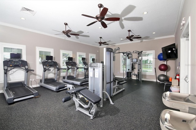 gym with ornamental molding