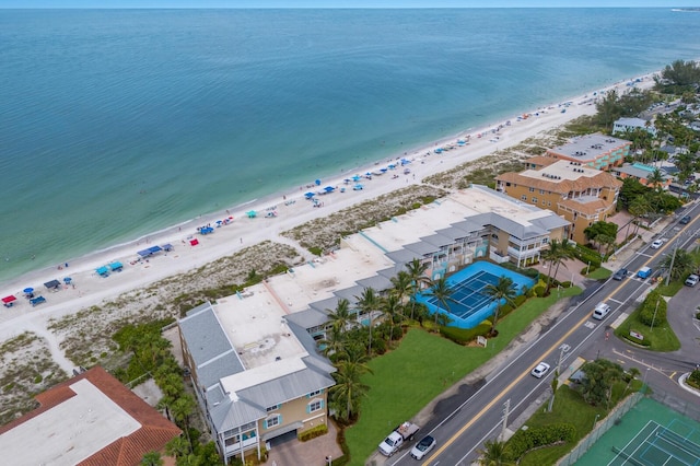 aerial view with a beach view and a water view