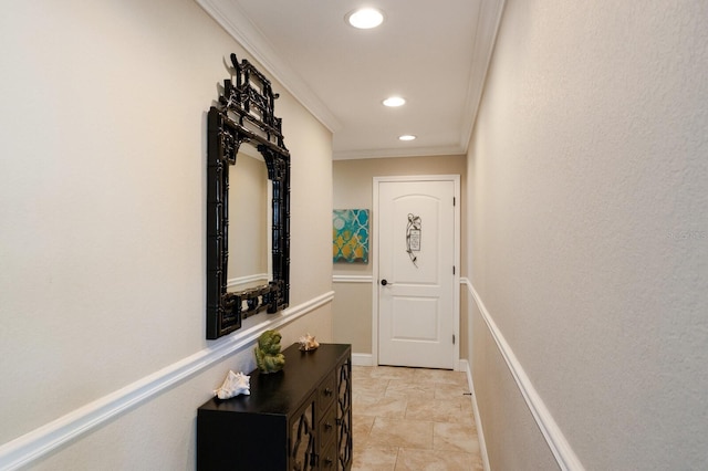 doorway to outside with ornamental molding