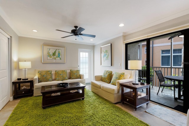 tiled living room featuring ceiling fan and crown molding