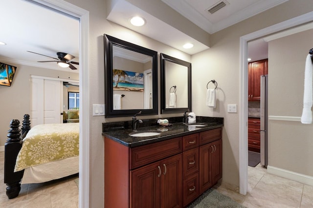 bathroom with vanity, tile patterned floors, ceiling fan, and ornamental molding