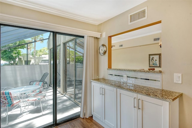 entryway with light hardwood / wood-style flooring