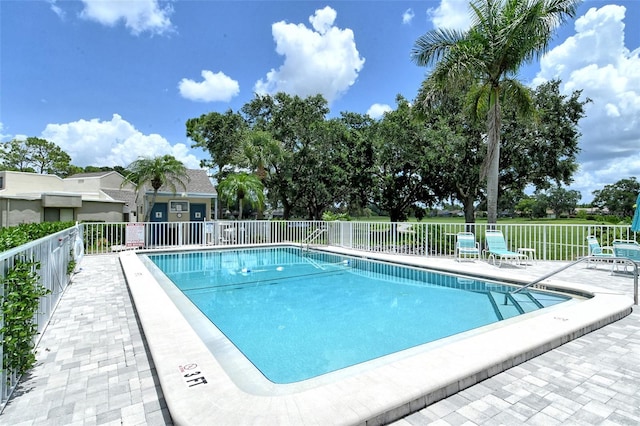 view of pool with a patio area