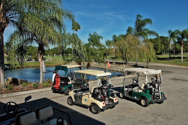 surrounding community with a water view