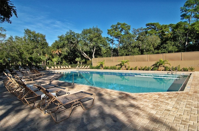 view of swimming pool featuring a patio