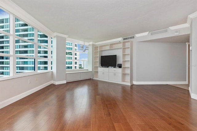 unfurnished living room with dark wood-type flooring