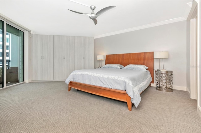 carpeted bedroom featuring crown molding, access to outside, and ceiling fan