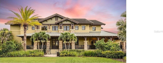 craftsman-style house with a lawn