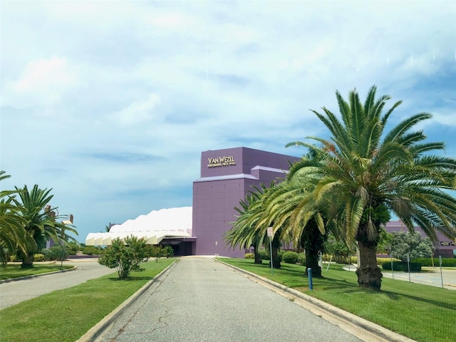 view of road featuring curbs