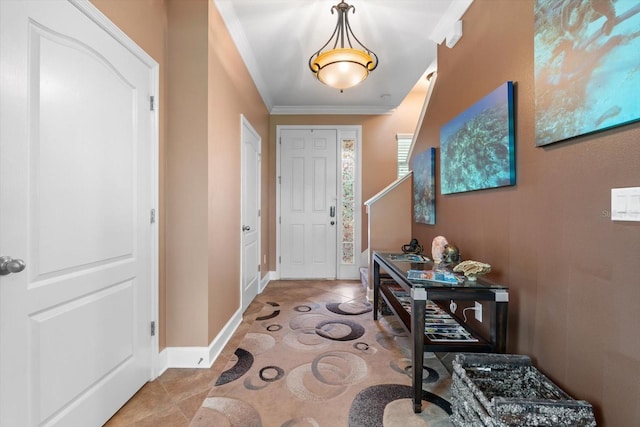 tiled entryway with ornamental molding