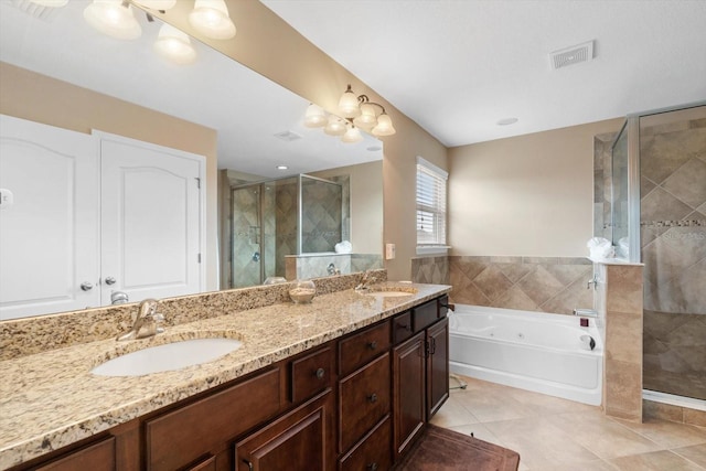 bathroom featuring vanity, plus walk in shower, and tile patterned floors