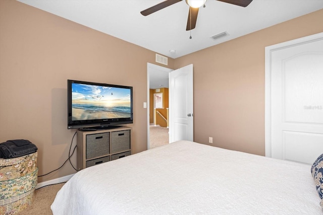 bedroom with ceiling fan and carpet flooring