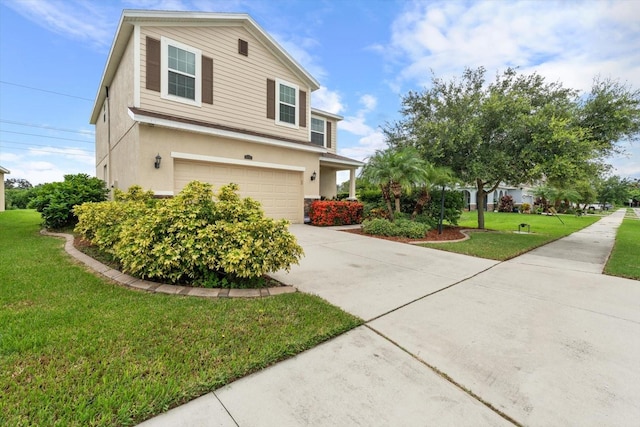 view of home's exterior with a yard and a garage