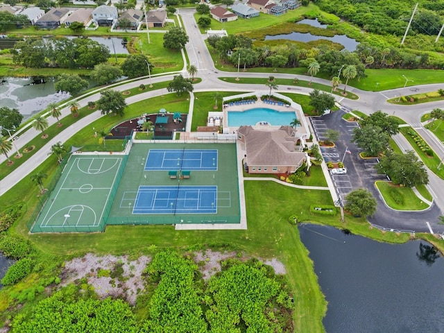 bird's eye view with a water view