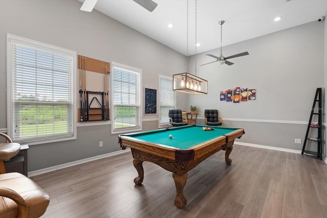 game room featuring light hardwood / wood-style floors, pool table, a healthy amount of sunlight, and ceiling fan