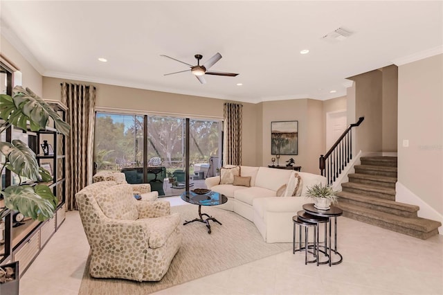 tiled living room with ceiling fan and ornamental molding