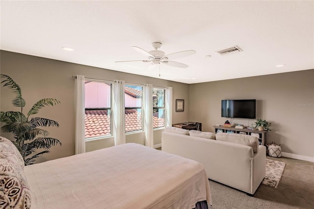 carpeted bedroom with ceiling fan