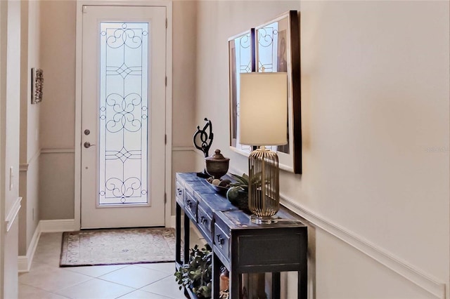 entrance foyer with light tile patterned floors