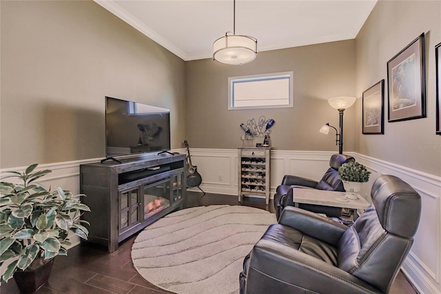 living room featuring dark hardwood / wood-style floors and crown molding