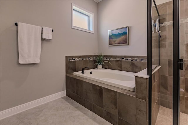 bathroom with tile patterned flooring and plus walk in shower