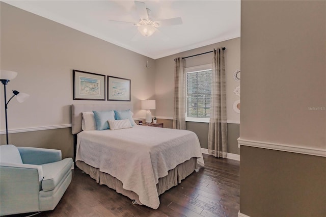 bedroom with ceiling fan and dark wood-type flooring