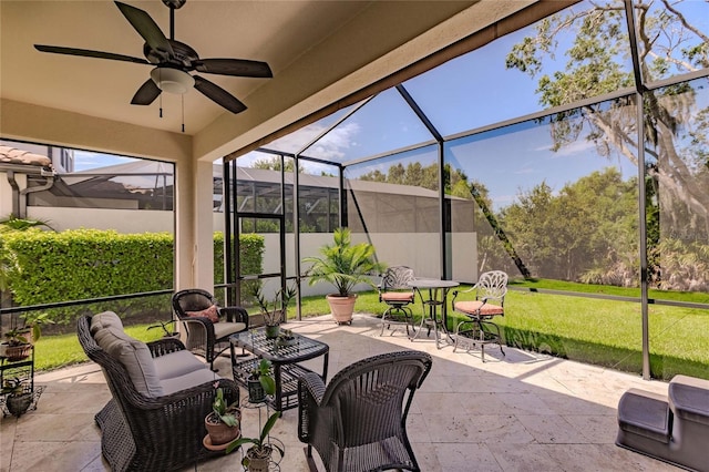 sunroom / solarium with ceiling fan