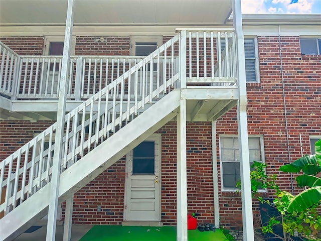 view of home's exterior with a balcony