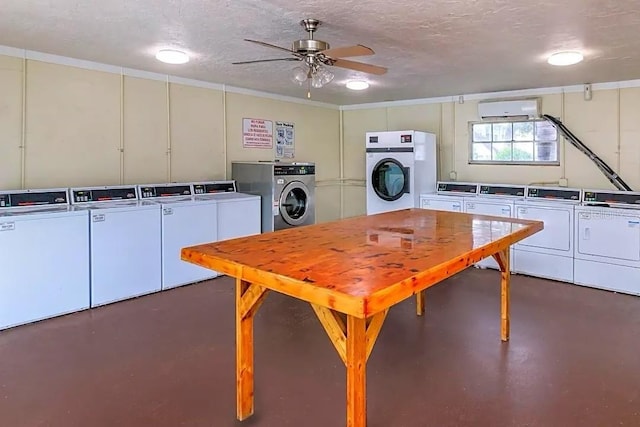 kitchen featuring ceiling fan, concrete flooring, and independent washer and dryer