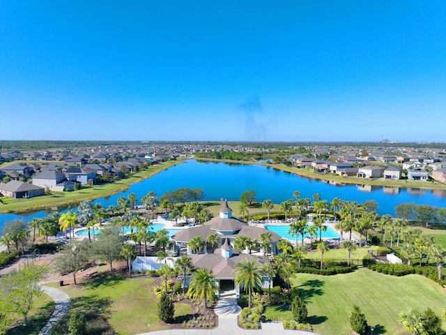 drone / aerial view with a water view