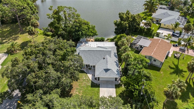 birds eye view of property featuring a water view