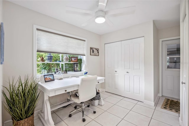 home office with ceiling fan and light tile patterned flooring