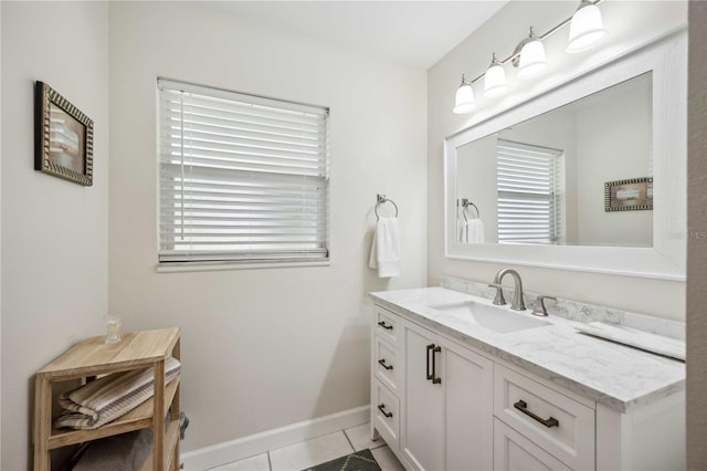 bathroom with vanity and tile patterned flooring