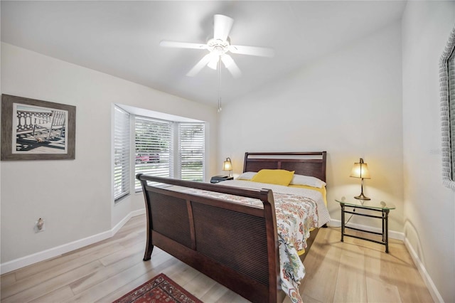 bedroom featuring light hardwood / wood-style flooring and ceiling fan