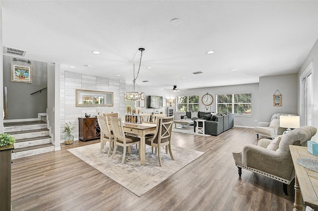 dining area featuring ceiling fan and hardwood / wood-style floors