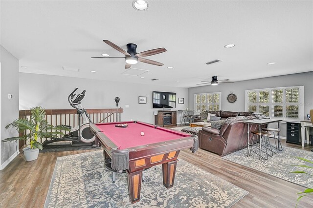 recreation room featuring ceiling fan, light wood-type flooring, and pool table