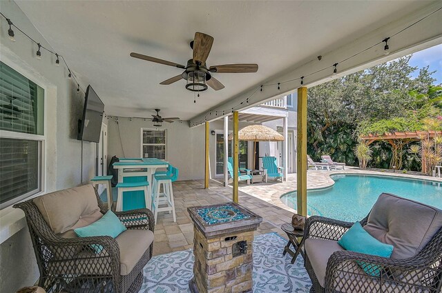 view of swimming pool with a patio and an outdoor hangout area