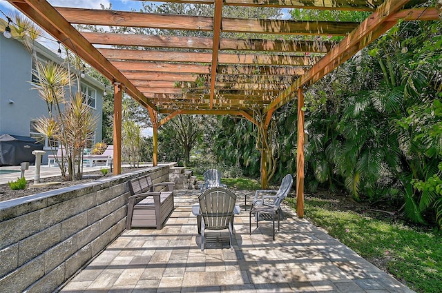 view of patio featuring a pergola and grilling area