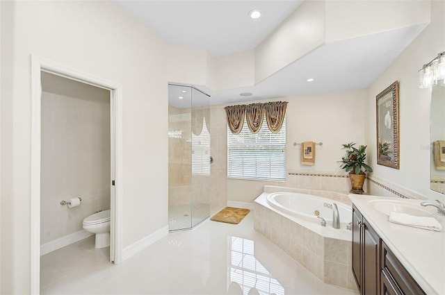 full bathroom featuring tile patterned floors, vanity, separate shower and tub, and toilet